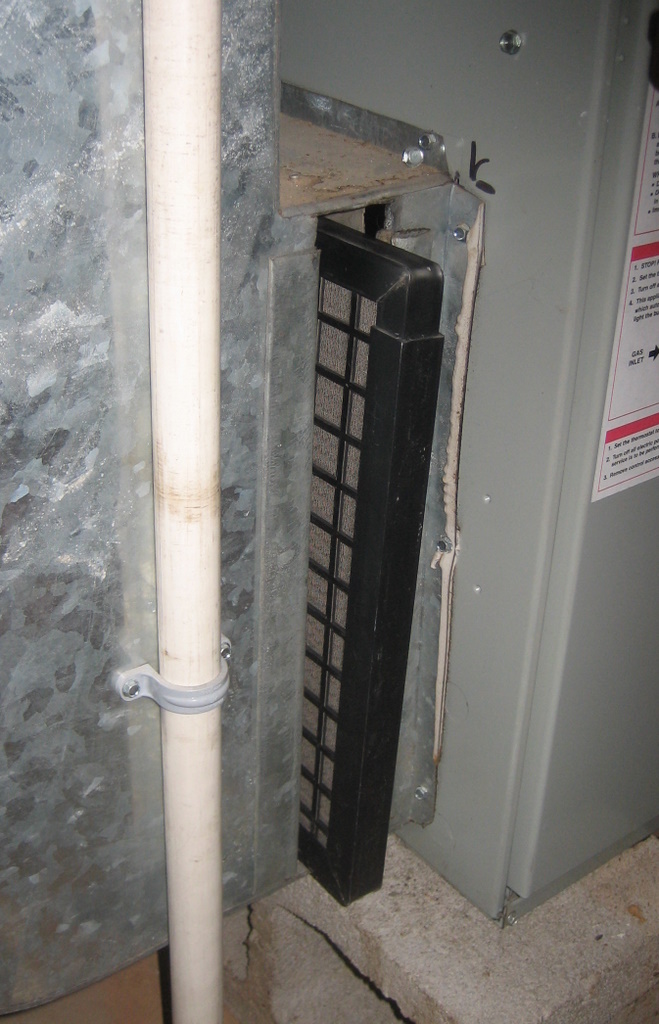 Open filter access port.