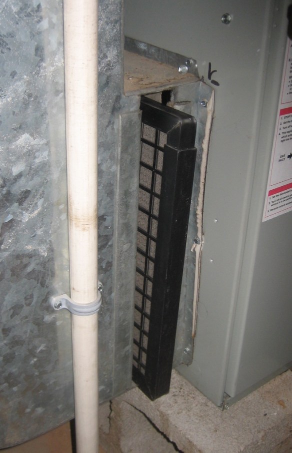 Open filter access port.